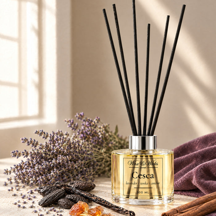 Cesca 100 ml reed diffuser with black fibre reeds, styled with dried lavender, tonka beans, cinnamon sticks, a vanilla pod and amber resin