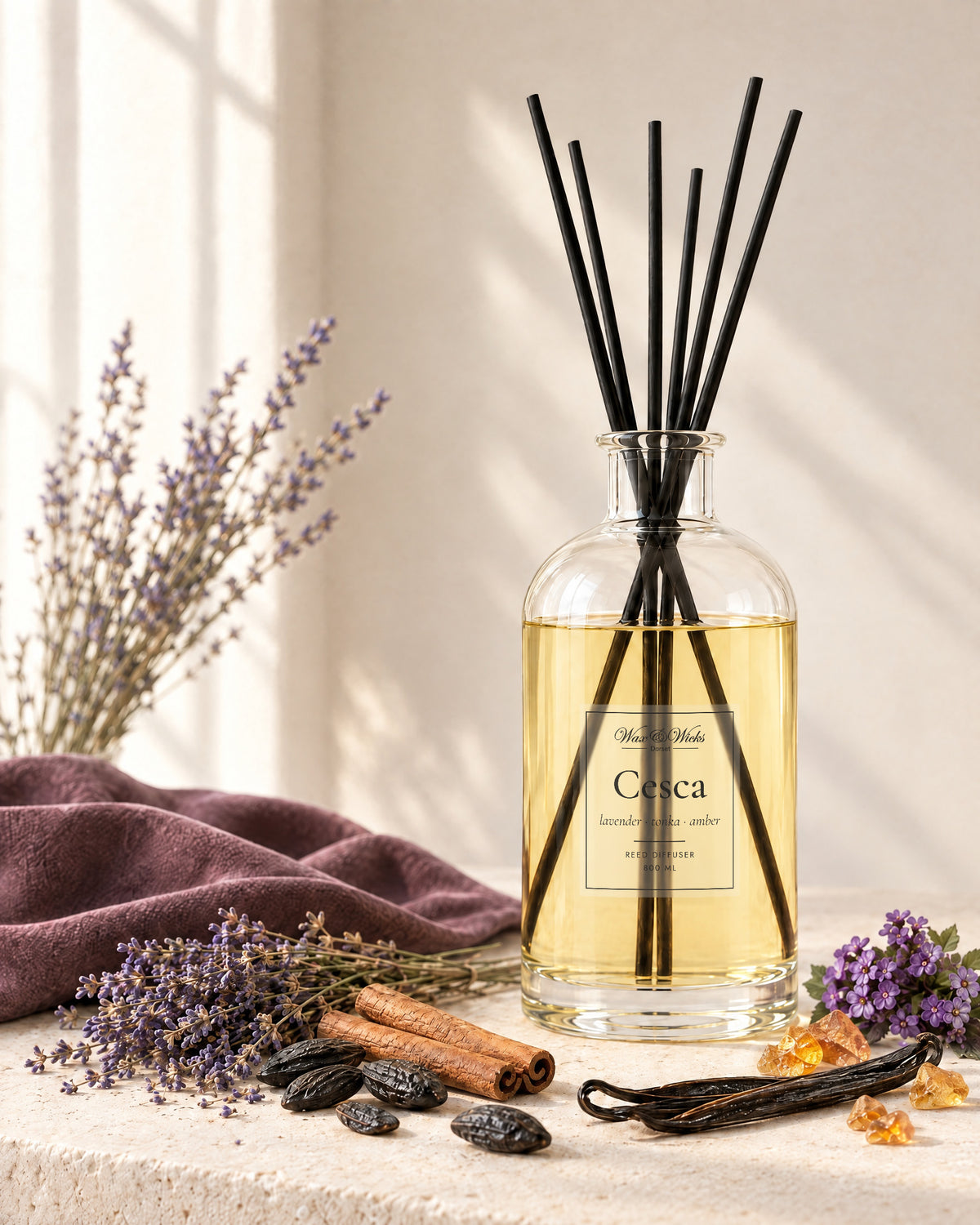 Cesca 800 ml large reed diffuser in apothecary-style glass with extra-long reeds, styled with dried lavender, tonka beans, cinnamon sticks, a vanilla pod and amber resin