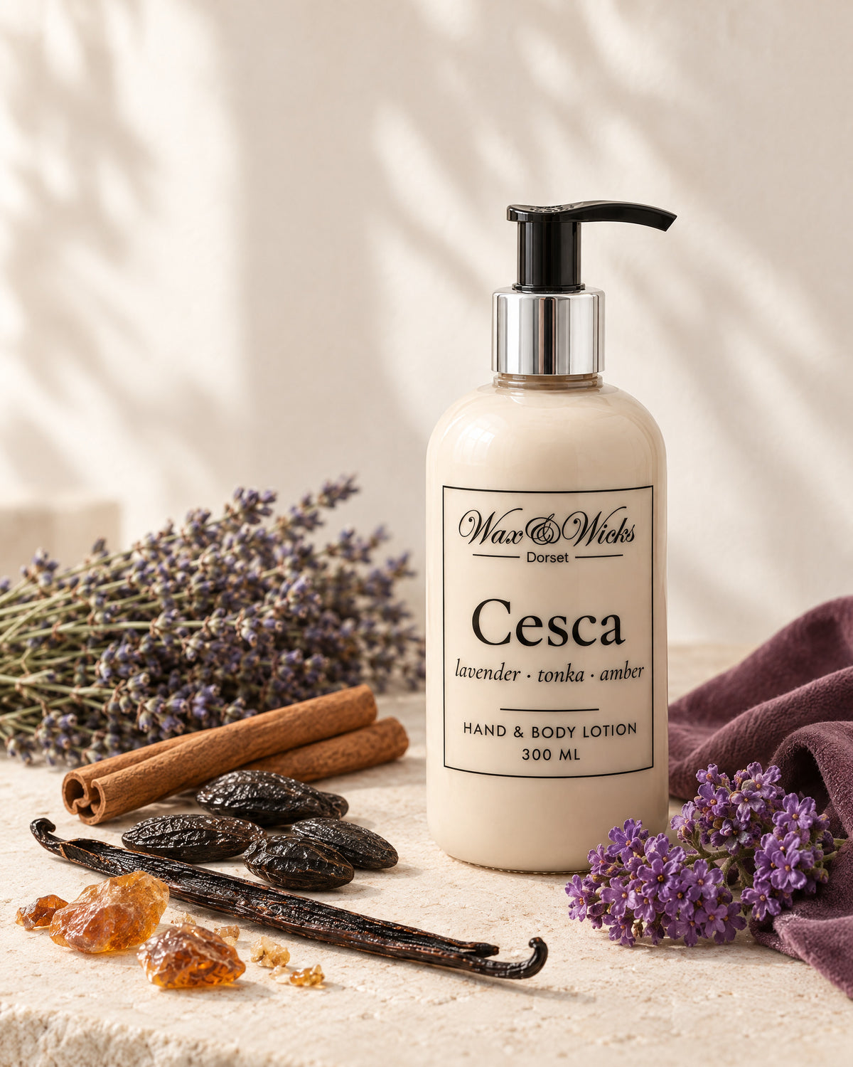 Cesca hand & body lotion, 300 ml pump bottle, styled with dried lavender, tonka beans, cinnamon sticks, a vanilla pod and amber resin