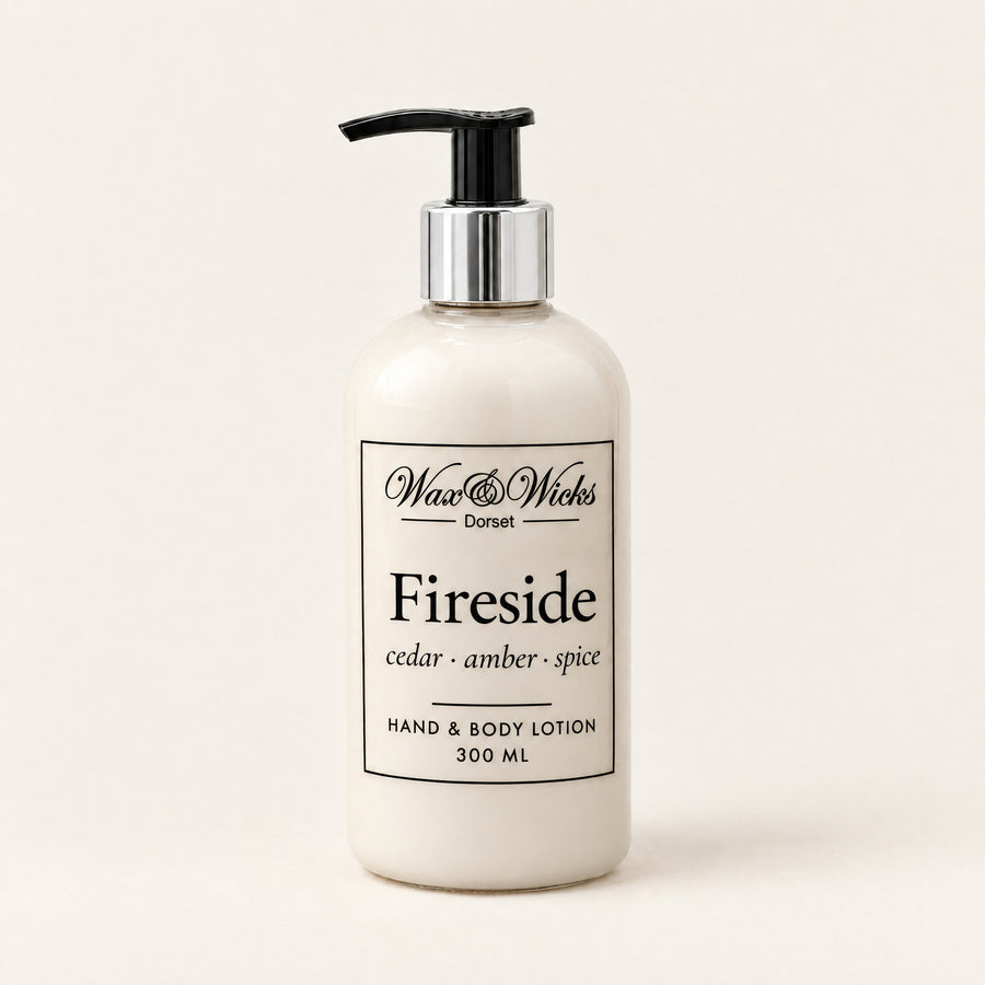 Fireside hand & body lotion, 300 ml pump bottle, on a plain ivory background