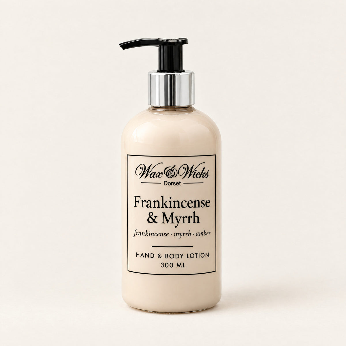 Frankincense & Myrrh hand & body lotion, 300 ml pump bottle, on a plain ivory background