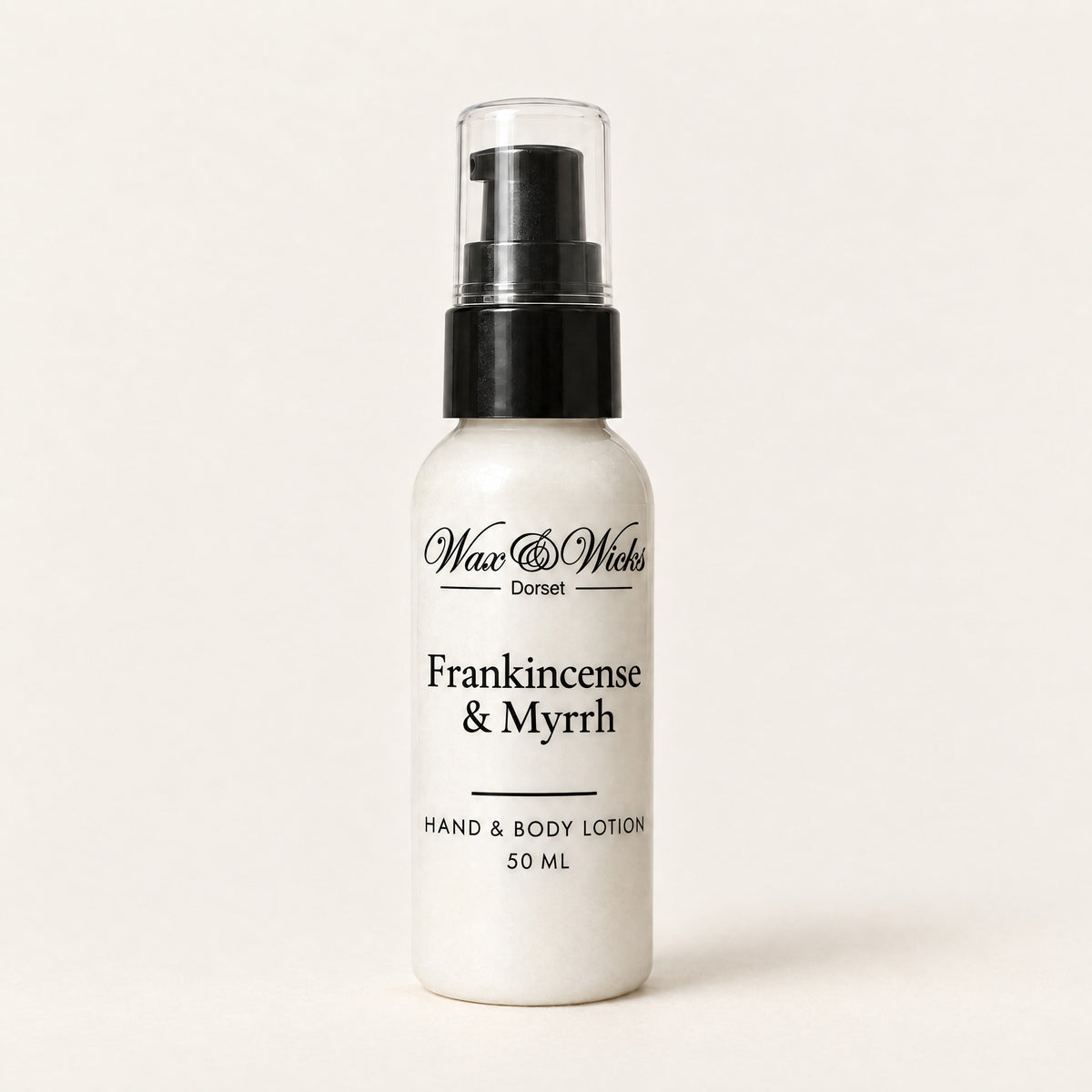 Frankincense & Myrrh hand & body lotion, 50 ml bottle, on a plain ivory background