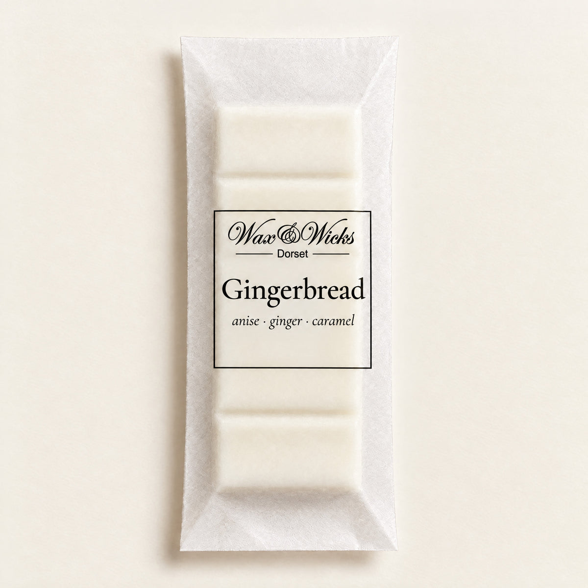 Gingerbread wax melt snap bar, on a plain ivory background