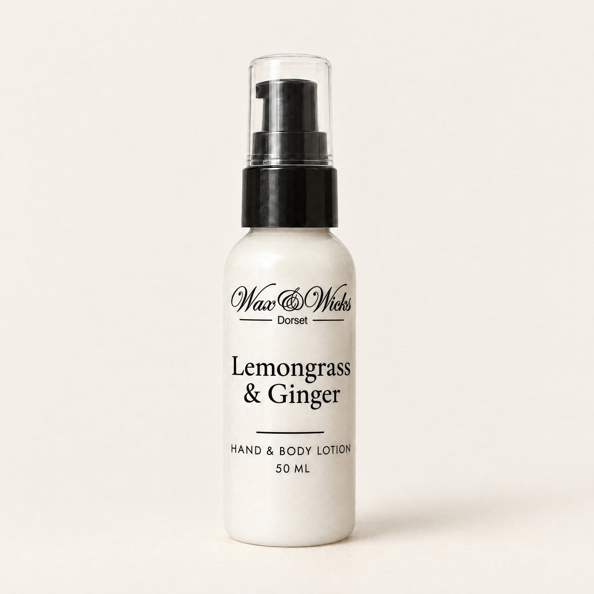 Lemongrass & Ginger hand & body lotion, 50 ml bottle, on a plain ivory background