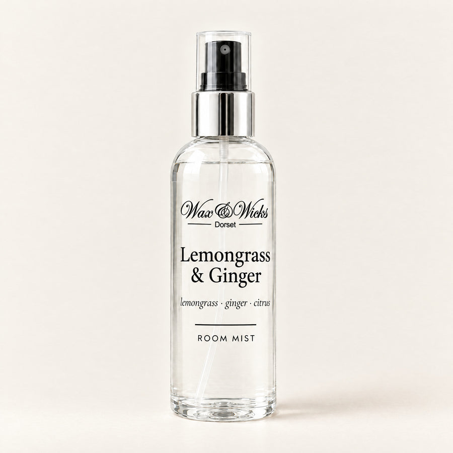 Lemongrass & Ginger room mist, 100 ml spray bottle, on a plain ivory background