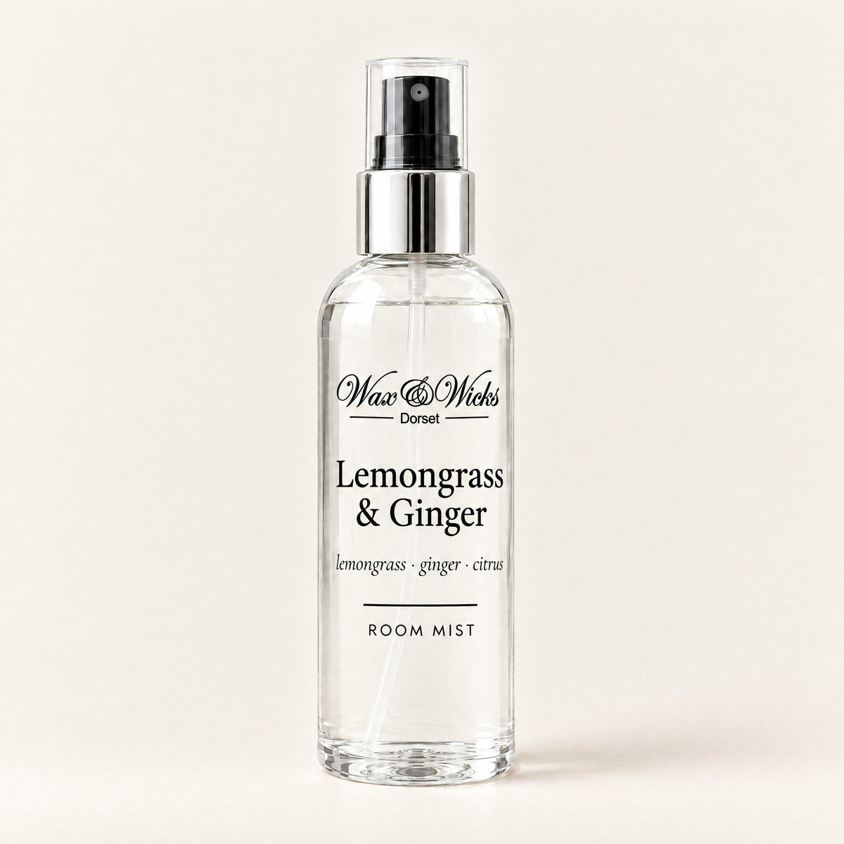 Lemongrass & Ginger room mist, 100 ml spray bottle, on a plain ivory background
