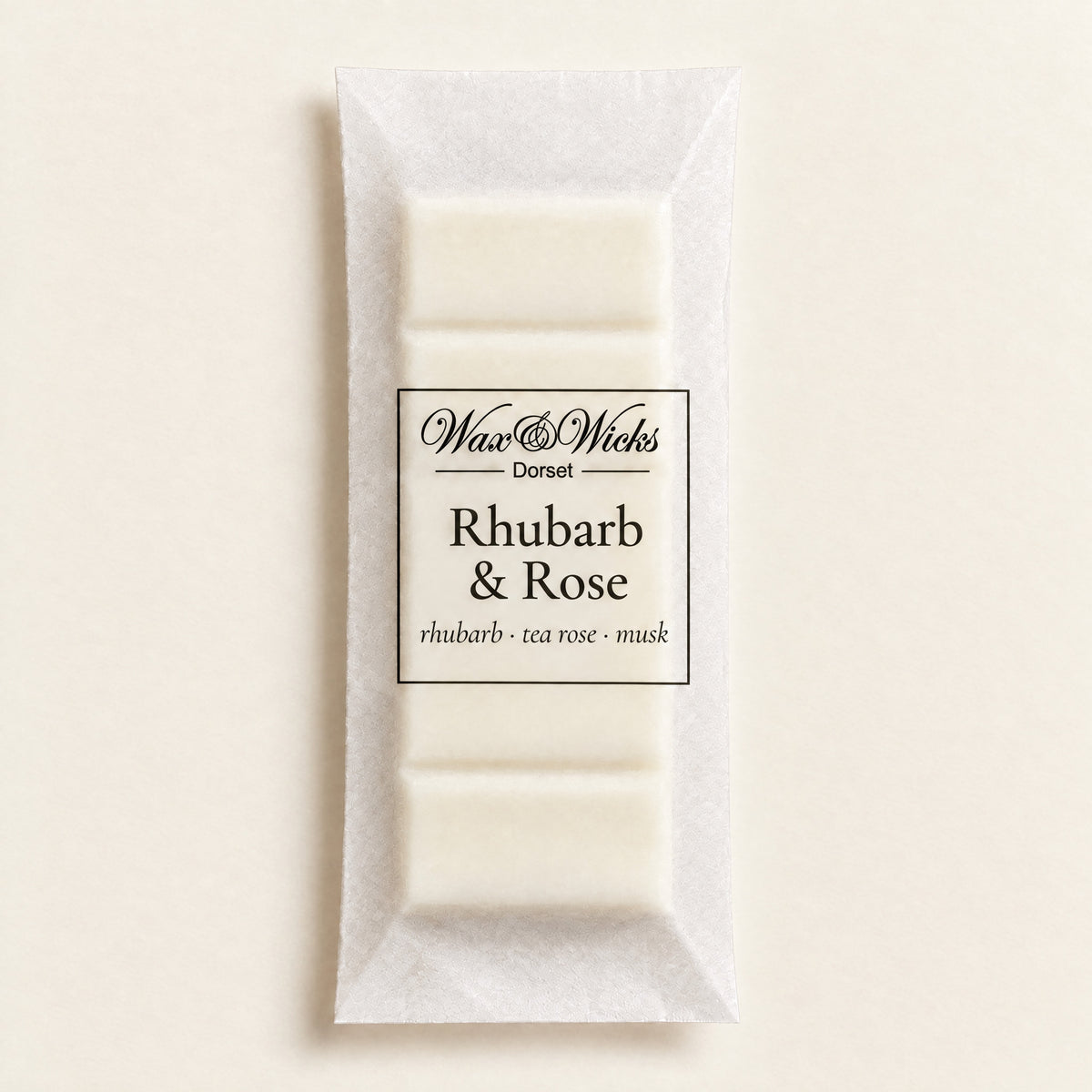Rhubarb & Rose wax melt snap bar, on a plain ivory background