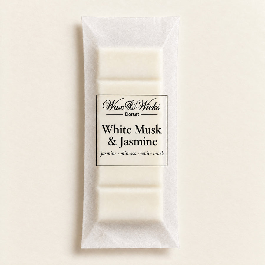 White Musk & Jasmine wax melt snap bar, on a plain ivory background