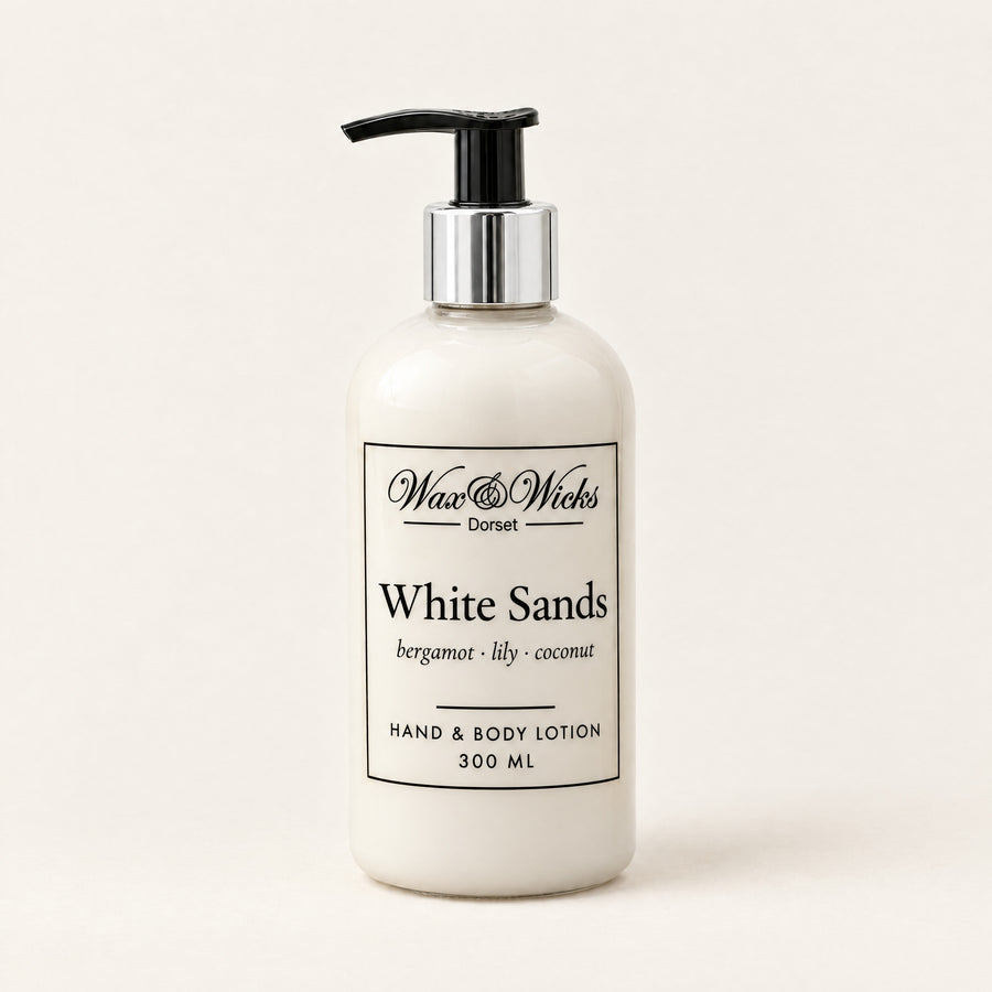 White Sands hand & body lotion, 300 ml pump bottle, on a plain ivory background