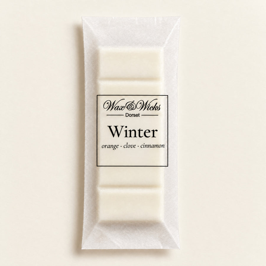 Winter wax melt snap bar, on a plain ivory background